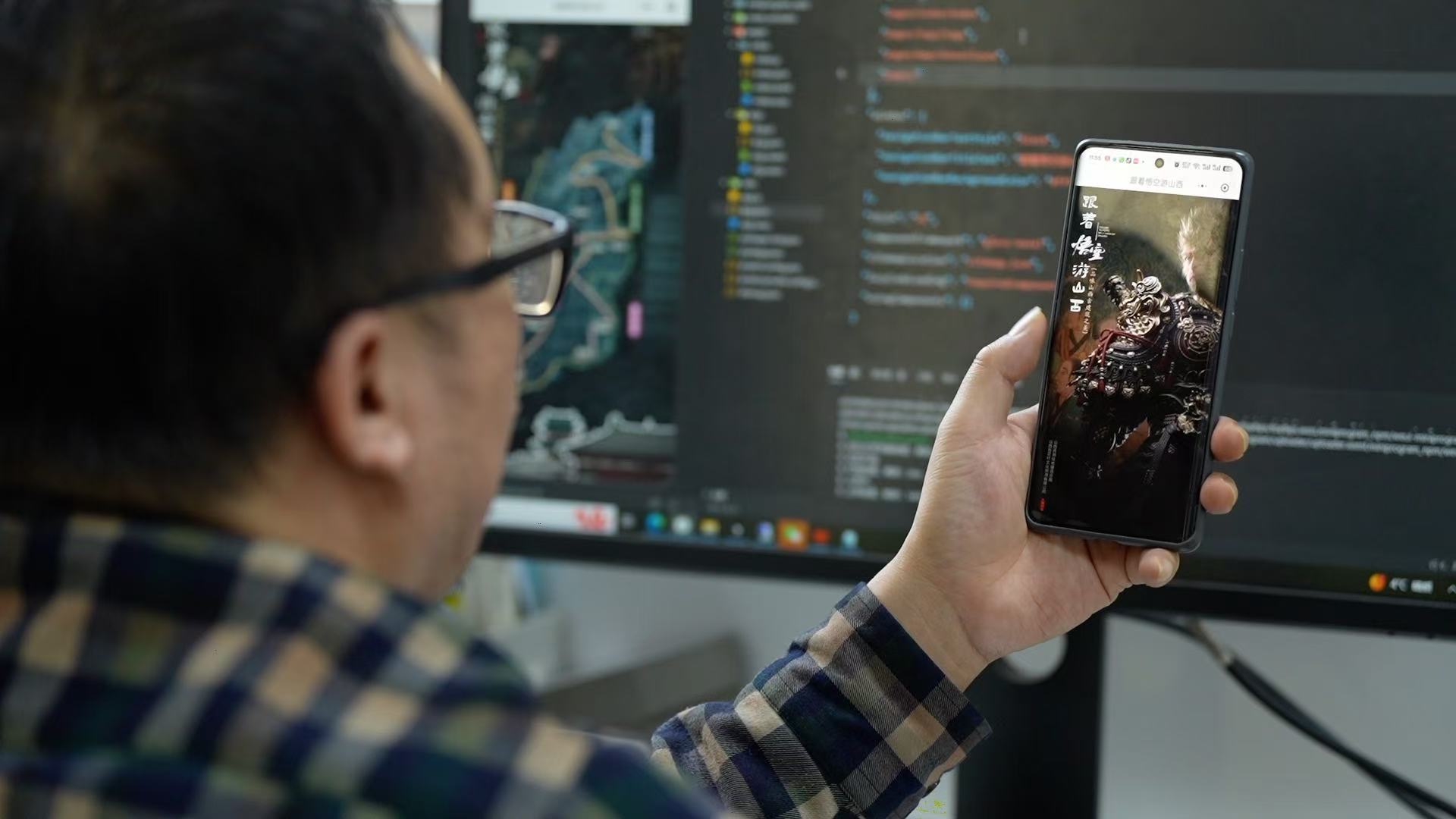 軟件開發工程師張俊平測試山西古建地圖微信小程序一級頁面。盧鵬宇 攝。