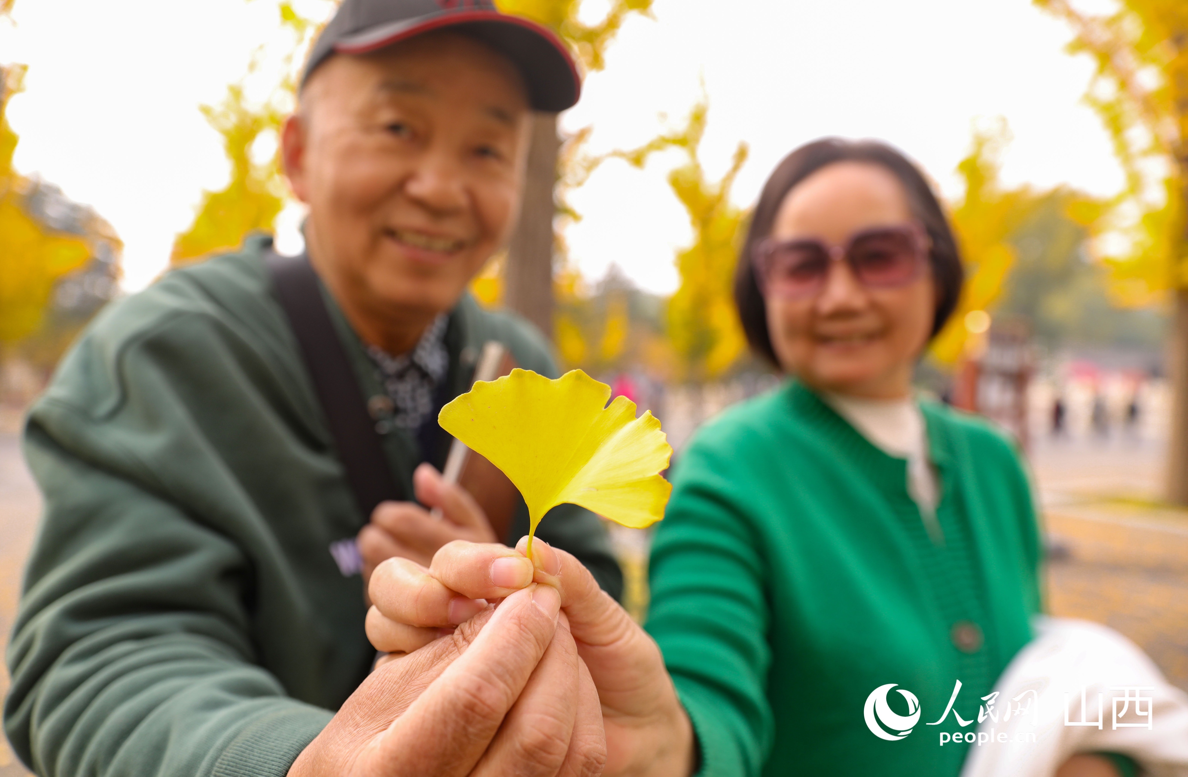美麗秋景，其樂融融。人民網記者 王帆攝